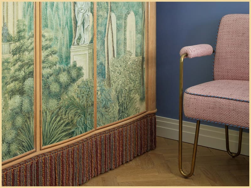 Blue Broadwick Soho bedroom with wardrobe artwork inspired by a 17th-century Bologna villa garden.